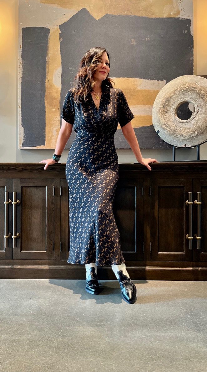 chic black dress with western boots